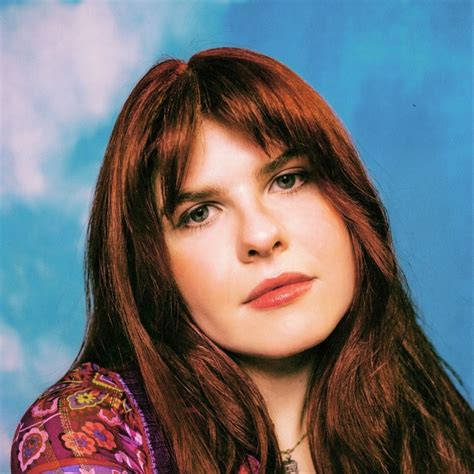 Catie Turner .